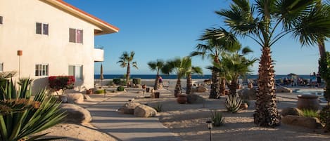 On the beach, sun loungers, beach towels
