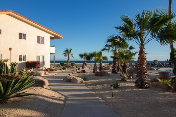 On the beach, sun-loungers, beach towels