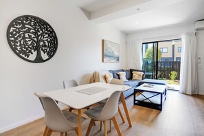 House | Living area | 42-inch LED TV with digital channels, TV, Netflix - Brand New House by Botany - Parking (Auckland)