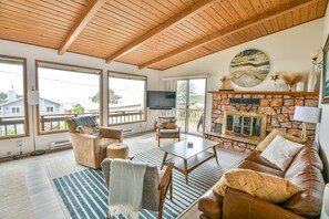 Smart TV, fireplace, books, music library