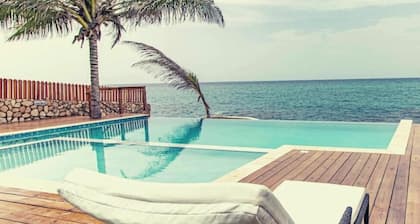 BluWaves ~ Oceanfront Condo minutes from Ocho Rios