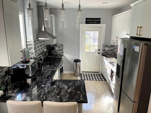 Fridge, microwave, oven, stovetop - NYC-Bound 3 BR Apt, Parking + Outdoor Urban Oasis (Jersey City)