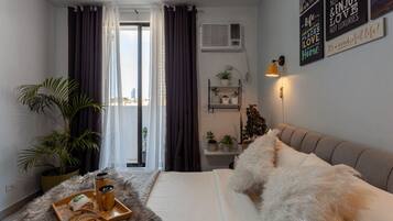 Exclusive Studio Suite | Down comforters, memory foam beds, individually decorated