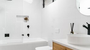 Combined shower/bathtub, hair dryer