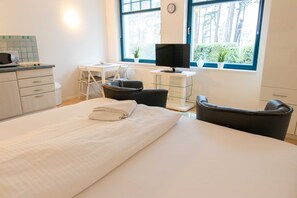 1 dormitori, un bressol de viatge, wifi i roba de llit