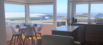 Beach House with Bay of Fires views, featuring 2 bedrooms with ensuite bathrooms