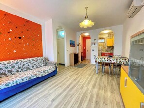 Apartment, 1 Bedroom, Balcony, Ocean View | Living area - Colourful Flat With a Balcony (Caorle)