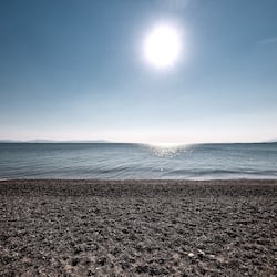 On the beach, sun loungers, beach umbrellas, beach towels