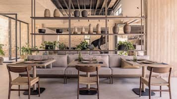 Breakfast, lunch, dinner served; Mediterranean cuisine, pool views