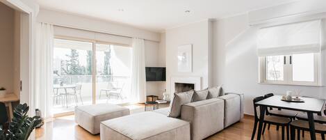 Standard Apartment | Living area | 43-inch Smart TV with satellite channels, TV, Netflix