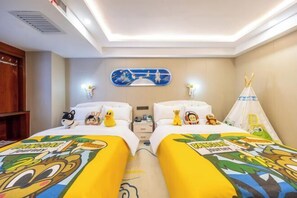 A hotel room with two beds, a nightstand, a wall-mounted artwork, and a teepee decoration.