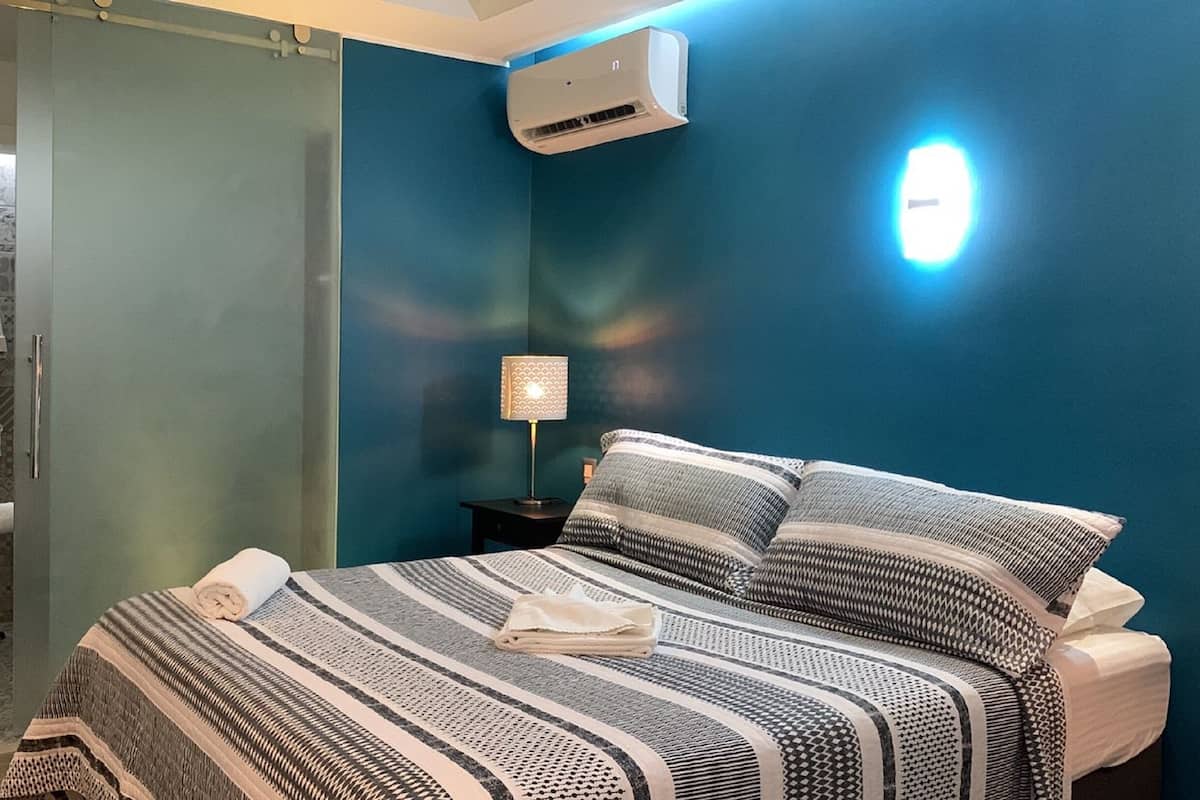 Deluxe Apartment, 1 Queen Bed, Pool View | 1 bedroom, free WiFi, bed sheets