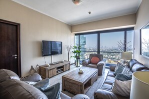 Classic Apartment | Living area | 32-inch flat-screen TV with cable channels, TV, Netflix - HiGuests - Goldcrest Views 1 (Dubai)