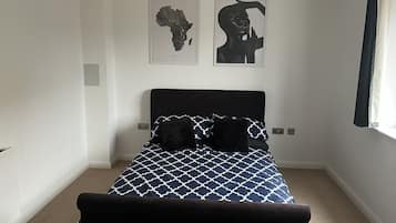 1 dormitorio, tabla de planchar con plancha, cuna de viaje y wifi gratis