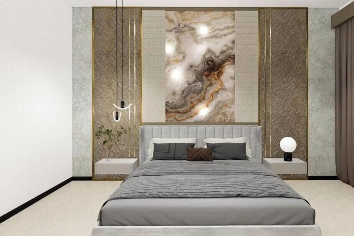 A modern bedroom with a large bed, a wall-mounted artwork, and a nightstand with a lamp.