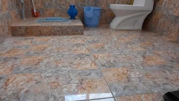 Shower, free toiletries, slippers, towels