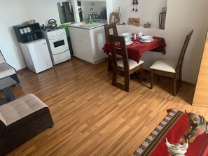 Fridge, microwave, dishwasher, cookware/dishes/utensils