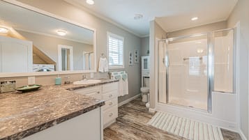 Combined shower/tub, hair dryer, towels, toilet paper