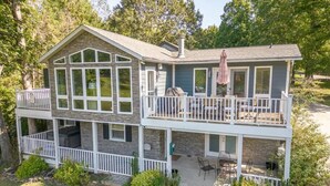 Outdoor dining - Lakefront Retreat with Game Room, Hot Tub, and Gym! (Goodview)