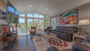 TV, offices - Lakefront Retreat with Game Room, Hot Tub, and Gym! (Goodview)