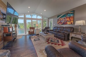 TV, offices - Lakefront Retreat with Game Room, Hot Tub, and Gym! (Goodview)