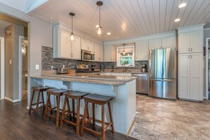 Fridge, microwave, oven, stovetop - Lakefront Retreat with Game Room, Hot Tub, and Gym! (Goodview)