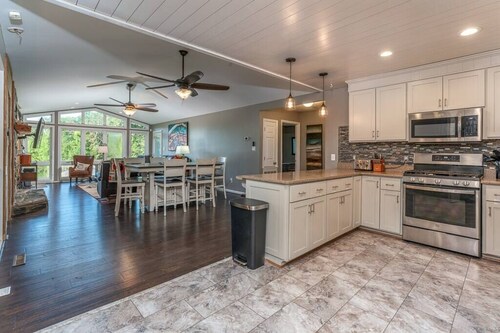 Lakefront Retreat with Game Room, Hot Tub, and Gym!