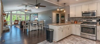 Lakefront Retreat with Game Room, Hot Tub, and Gym!