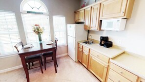 Condo, 2 Bedrooms | Private kitchen | Oven, cookware/dishes/utensils