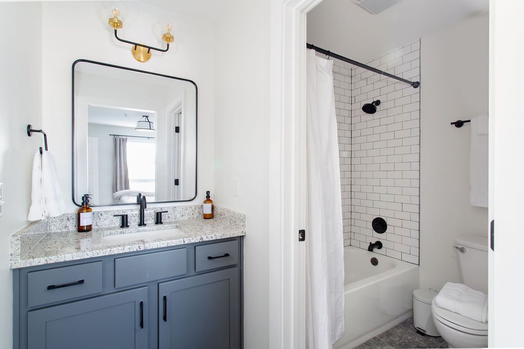 Combined shower/tub, hair dryer, towels, soap