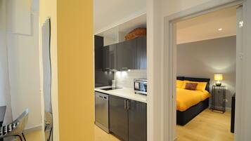 1 Schlafzimmer, BĂŒgeleisen/BĂŒgelbrett, kostenloses WLAN, BettwĂ€sche