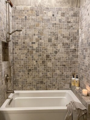 Combined shower/tub, hair dryer, towels, soap
