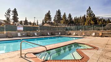 Relax by the pool with a clear view of the surrounding landscape.