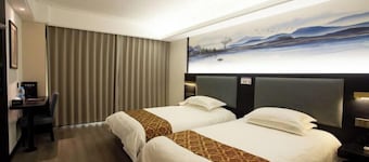 Xin Kai Yue Hotel