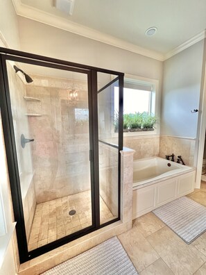 Bathtub, hair dryer, towels, soap