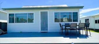 Lakeside House Tuncurry with deck overlooking the lake
