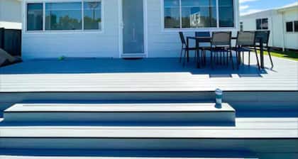Lakeside House Tuncurry with deck overlooking the lake