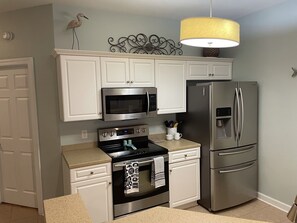 Fridge, microwave, oven, stovetop - Ground Floor Unit Champions at Sea Trail Villa Close to beach and golf (Sunset Beach)