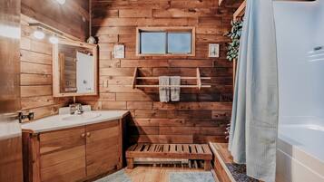 Shower, towels, soap, toilet paper