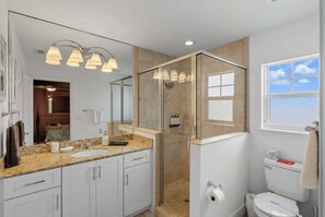 Shower, hair dryer, towels, soap