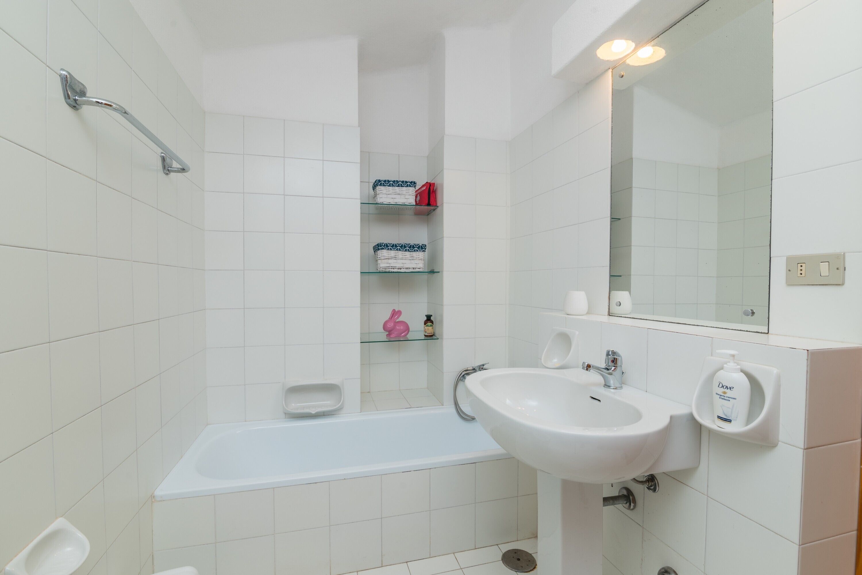 Bathtub, hair dryer, towels