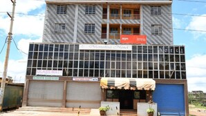 A hotel with a signboard for Monalisa Hotel, a glass matt sign, and a paint tinting machine sign. - Monalisa Hotel Thika (Thika)