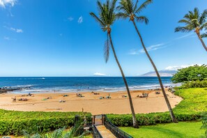 On the beach, sun loungers, beach towels