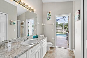 Combined shower/tub, hair dryer, towels, soap