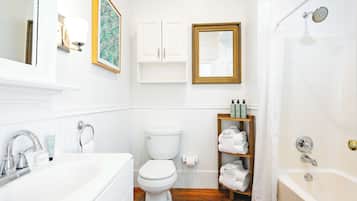 Bathtub, hair dryer, towels