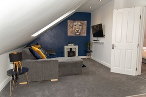 Apartment, 1 Queen-Bett und Schlafsofa | Wohnzimmer