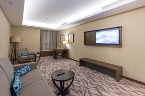 Premium Suite | Living area | 52-inch LED TV with satellite channels, TV - Az Hotels Grand Oran (Es Senia)