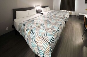 Escritorio, wifi gratis y ropa de cama 