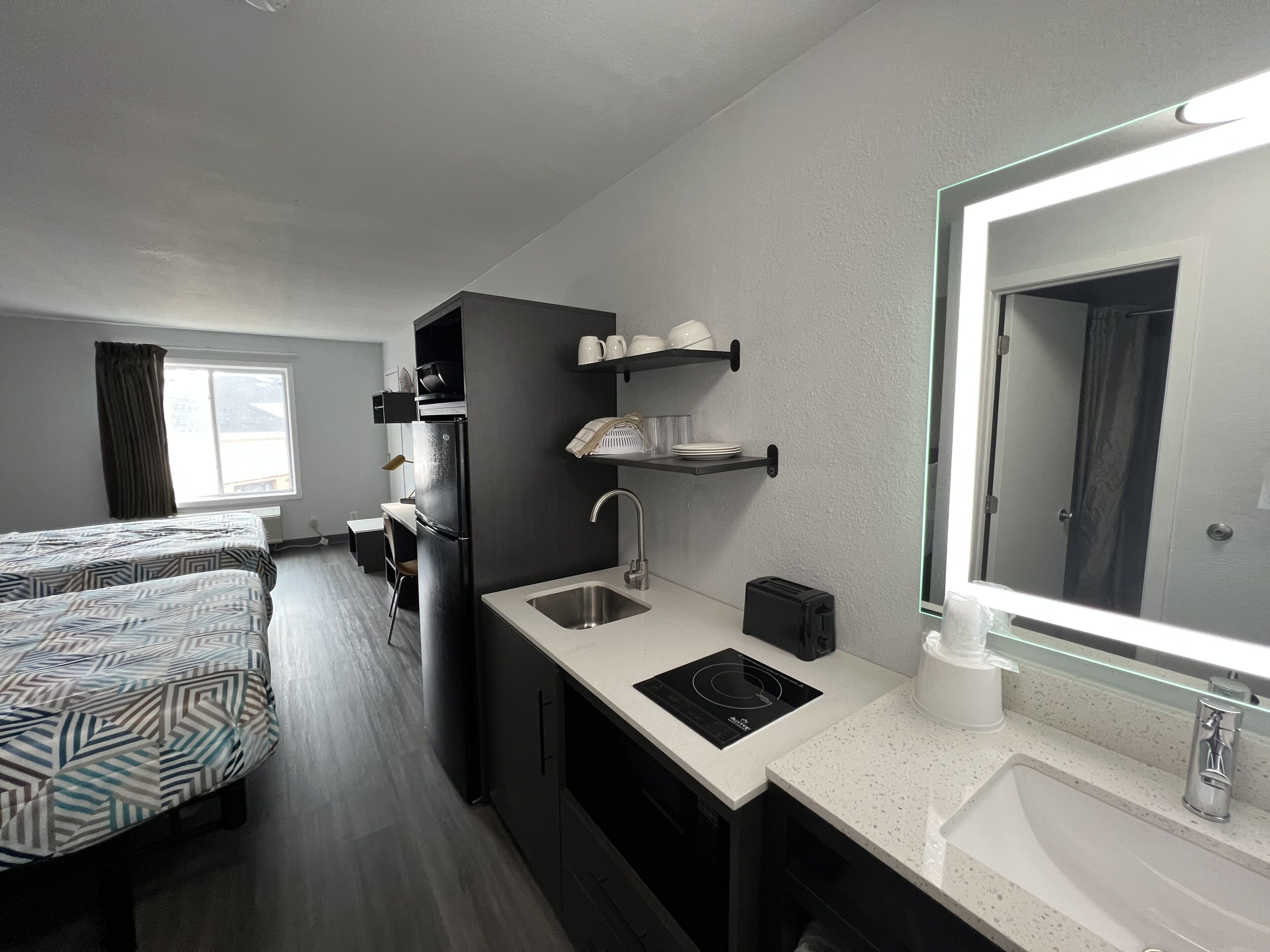 Full-size fridge, microwave, stovetop, toaster