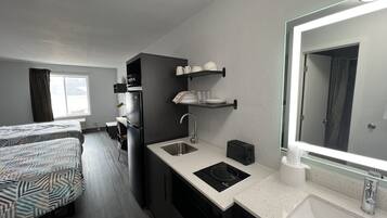 Full-size fridge, microwave, stovetop, toaster